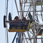 Attendees of the Kenai Peninsula Fair smile for the camera on Saturday, Aug. 17, 2019 at the fairgrounds in Ninilchik, Alaska. (Photo by Brian Mazurek/Peninsula Clarion)