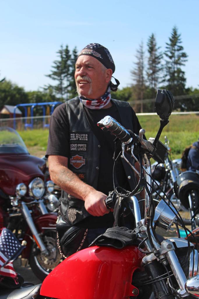 Participants in the inaugural Homer Suicide Awareness and Prevention Ride and Drive wait for things to get started Saturday, Aug. 17, 2019 in the parking lot of Homer Christian Church on East End Road in Homer, Alaska. (Photo by Megan Pacer/Homer News)