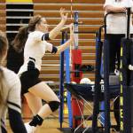 Homers Laura Inama sets the ball across the net to Nikiski during the final game of the Homer Jamboree on Saturday, Aug. 24, 2019 in the Alice Witt Gymnasium in Homer, Alaska. (Photo by Megan Pacer/Homer News)