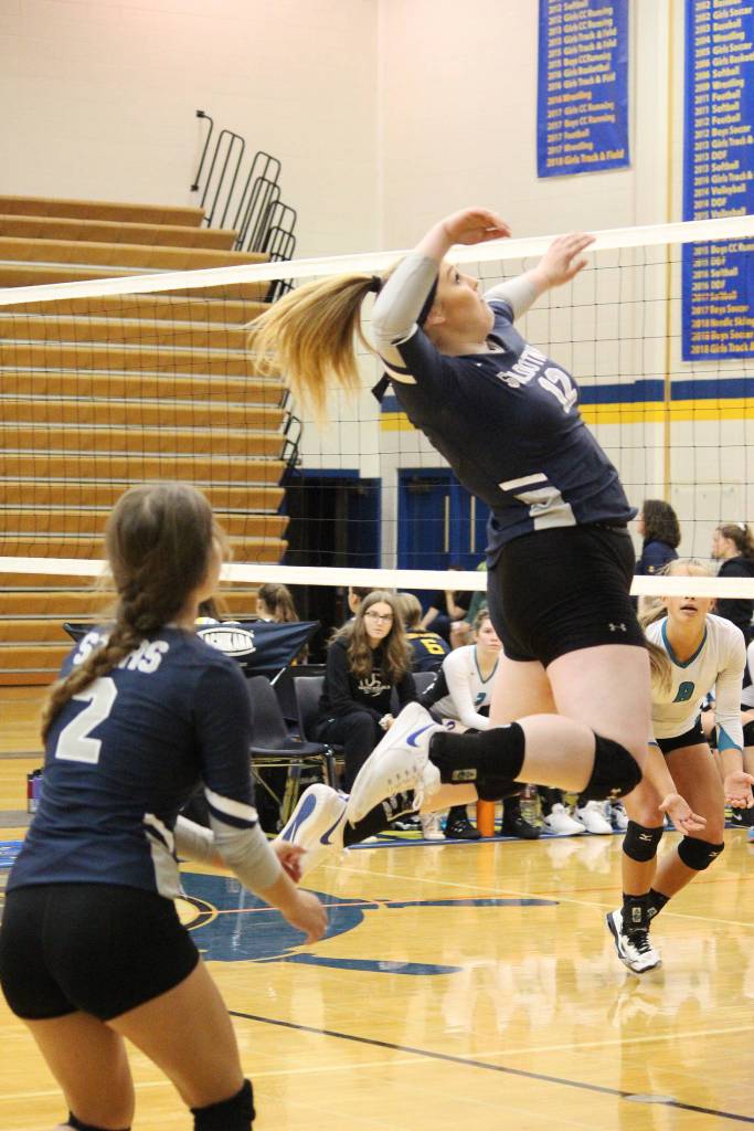 Soldotnas Bailiey Armstrong jumps to spike the ball across the net to the Nikiski Bulldogs during a game at the Homer Jamboree tournament Saturday, Aug. 24, 2019 at the Alice Witt Gymnasium in Homer, Alaska. (Photo by Megan Pacer/Homer News)