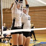 Homers Kelli Bishop (left) and Tonda Smude (right) jump to block a shot from the Nikiski Bulldogs during a Saturday, Aug. 24, 2019 volleyball game during the Homer Jamboree tournament in the Alice Witt Gymnasium in Homer, Alaska. (Photo by Megan Pacer/Homer News)