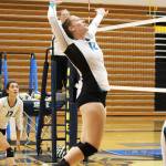 Kaycee Bostic jumps to spike the ball during the final game of the Homer Jamboree against the Homer Mariners on Saturday, Aug. 24, 2019 in the Alice Witt Gymnasium in Homer, Alaska. (Photo by Megan Pacer/Homer News)