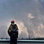 Trinity Hotshots battling the Swan Lake Fire hold the line during burnout operations along the Sterling Highway in Alaska on Aug. 26, 2019. (Photo courtesy Great Basin Incident Management Team)