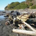 An abandoned Yamaha ATV sits on the Diamond Creek beach on Oct. 9, 2011, near Homer, Alaska. CoastWalk volunteers document beach trash such as this  and try to collect it. (Homer News file photo)