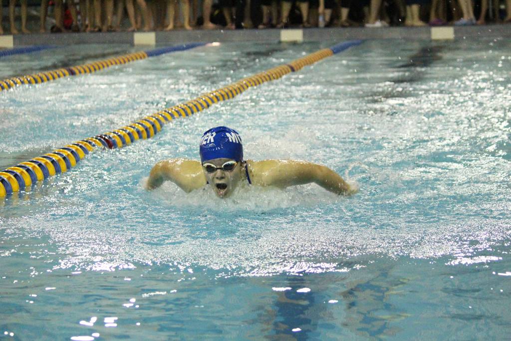 Palmer swimmer Ally Ferguson competes in the girls 100 yard butterfly race during the Homer Invite on Saturday, Sept. 7, 2019 at the Kate Kuhns Aquatic Center in Homer, Alaska. (Photo by Megan Pacer/Homer News)