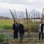 Burning Basket facilitator Mavis Muller, right, guides volunteers in building the 16th annual Burning Basket, Radiate, on Monday, Sept. 9, 2019, at Mariner Park on the Homer Spit in Homer, Alaska. (Photo by Michael Armstrong/Homer News)