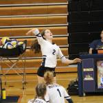 Homers Laura Inama jumps to spike the ball during a Saturday, Sept. 14, 2019 volleyball game against Nikiski at Homer High School in Homer, Alaska. (Photo by Megan Pacer/Homer News)