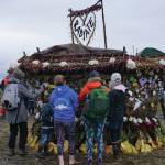 Visitors interact with Radiate, the 16th annual Burning Basket, on Sunday night, Sept. 15, 2019, at Mariner Park on the Homer Spit in Homer, Alaska. (Photo by Michael Armstrong/Homer News)