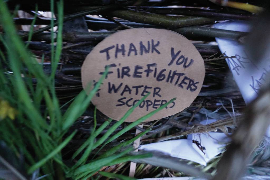 One of the signs on Radiate, the 16th annual Burning Basket. The basket was burned on Sunday night, Sept. 15, 2019, at Mariner Park on the Homer Spit in Homer, Alaska. (Photo by Michael Armstrong/Homer News)