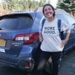 Mary Latham stands by her borrowed blue Subaru Outback on Sept. 16, 2019, in Homer, Alaska. Latham has been touring the United States collecting stories of human kindness to put in a book for people to read in hospital waiting rooms. Alaska is the 48th state Latham has visited since starting her trip in September 2016. (Photo by Michael Armstrong/Homer News)