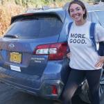 Mary Latham stands by her borrowed blue Subaru Outback on Sept. 16, 2019, in Homer, Alaska. Latham has been touring the United States collecting stories of human kindness to put in a book for people to read in hospital waiting rooms. Alaska is the 48th state Latham has visited since starting her trip in September 2016. (Photo by Michael Armstrong/Homer News)