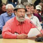 Frtiz Creek area resident Barrett Fletcher gives the invocation before a Tuesday, Sept. 17 2019 Kenai Peninsula Borough Assembly meeting as a representative of the Church of the Flying Spaghetti Monster at Homer City Hall in Homer, Alaska. (Photo by Megan Pacer/Homer News)