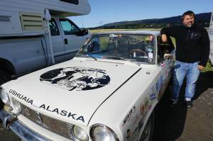 Héctor Argiró stands by his 1969 Torino at on Tuesday, Sept. 16, 2019, at Mariner Park on the Homer Spit in Homer, Alaska. Starting on Nov. 24, 2016, Argiró drove the Argentinian classic car from Buenos Aires to Ushuaia, Argentina, and north to Alaska through South America, Central America, Mexico, the western United States, and Canada. He plans to continue his trip through North America and then to Europe. For more about El Mundo en Torino (Around the world in a Torino), visit www.elmundoentorino.com. (Photo by Michael Armstrong/Homer News)