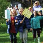 As part of their weekly Friday walks to local parks, Little Fireweed Academy students held a We love the Earth March to WKFL Park on Sept. 20, 2019, in Homer, Alaska. The kindergarten through second-grade students have been learning about ecology and animals and their connection to the earth. The march wasnt associated with the Strike for the Climate held the same day. (Photo by Michael Armstrong/Homer News)