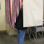 A Homer city resident casts their vote in the Tuesday, Oct. 1, 2019 municipal election at Homer City Hall in Homer, Alaska. (Photo by Megan Pacer/Homer News)