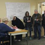 Homer city residents line up to cast their votes in the Tuesday, Oct. 1, 2019 municipal election at Homer City Hall in Homer, Alaska. (Photo by Megan Pacer/Homer News)