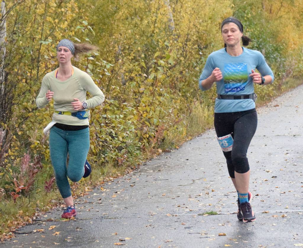 Homers Elizabeth Roedl and Homers Stacey Buckelew compete in the Kenai River Marathon on Sunday, Sept. 29, 2019, in Alaska. Buckelew won the Marathon, while Roedl was second. (Photo by Jeff Helminiak/Peninsula Clarion)