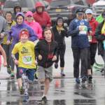 Runners conquer rain, wind at Kenai River Marathon