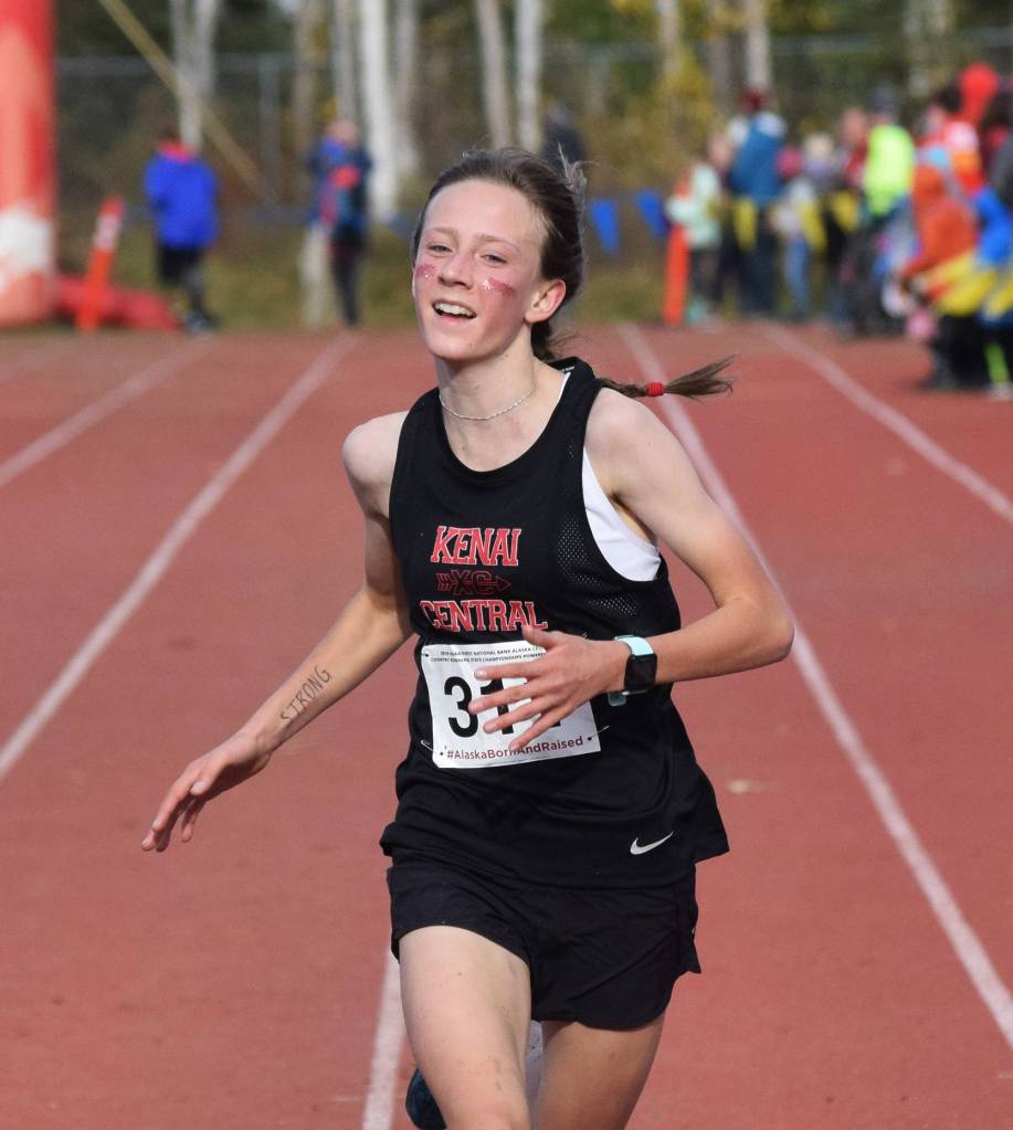 Kenais Jayna Boonstra crosses the finish of the Div. II girls state cross-country championships Saturday, Oct. 5, 2019, on the Bartlett High trails in Anchorage, Alaska. (Photo by Joey Klecka/Peninsula Clarion)