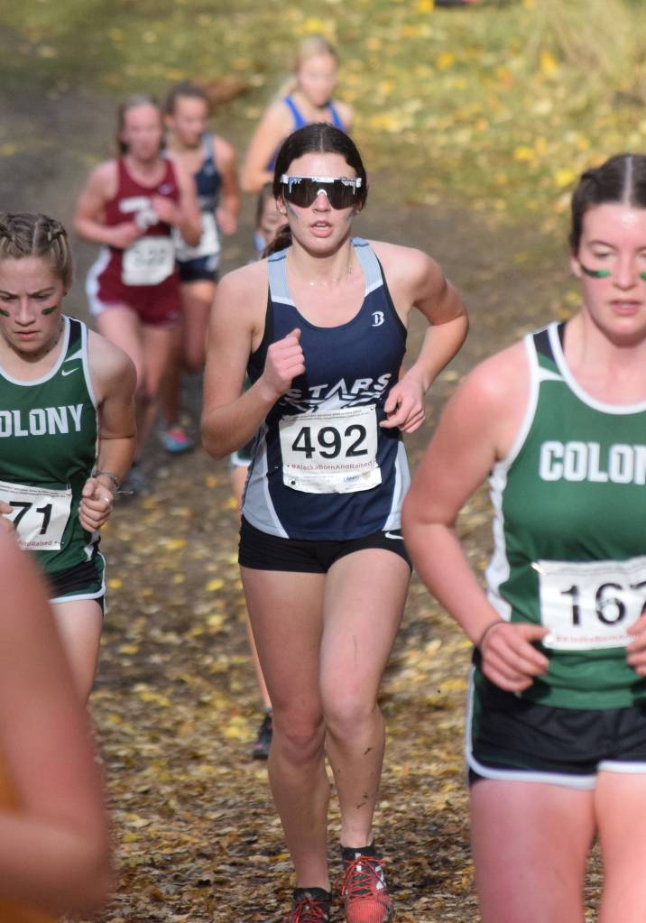 Soldotnas Ellie Burns tackles a hill at the Div. I girls state cross-country championships Saturday, Oct. 5, 2019, on the Bartlett High trails in Anchorage, Alaska. (Photo by Joey Klecka/Peninsula Clarion)