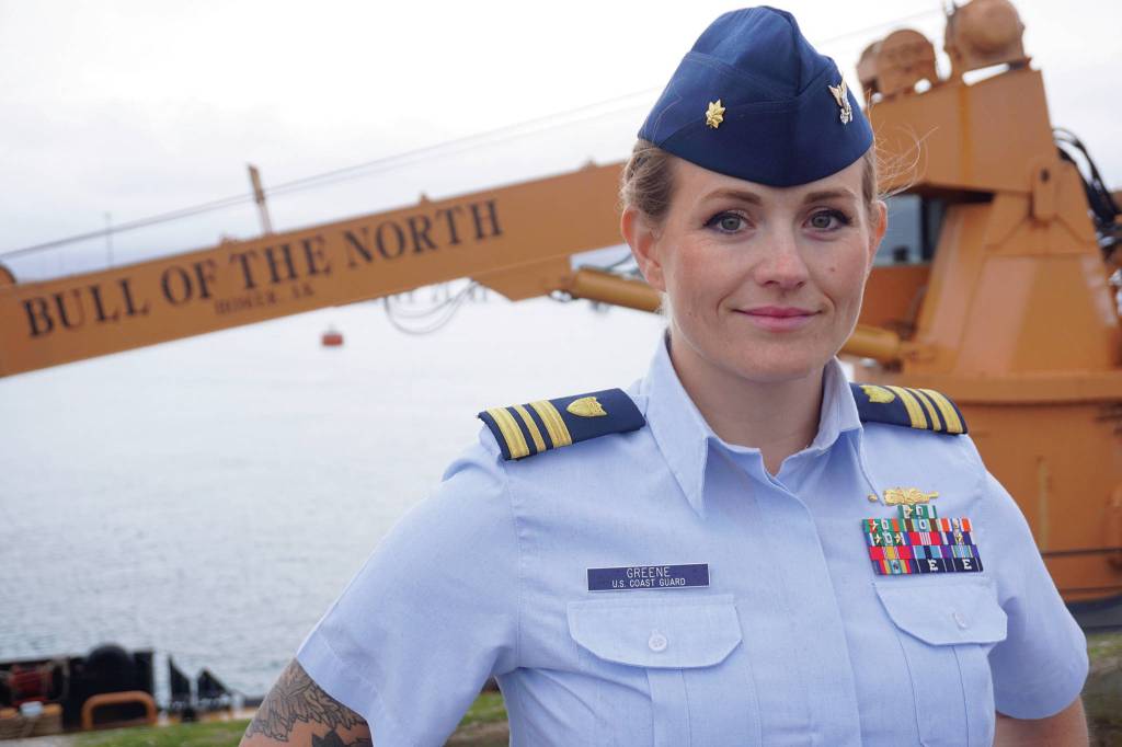 The new U.S. Coast Guard Cutter Hickory Captain, Lt. Cmdr. Jeannette M. Greene, poses in front of the Hickory, nicknamed The Bull of the North, after Greenes assumption of command ceremony on Friday, Oct. 4, 2019, at the Pioneer Dock, in Homer, Alaska. (Photo by Michael Armstrong/Homer News)