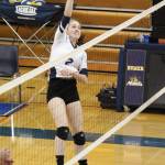 Homers Laura Inama spikes the ball in a Tuesday, Oct. 8, 2019 volleyball game against Soldotna High School at the Alice Witte Gymnasium in Homer, Alaska. (Photo by Megan Pacer/Homer News)