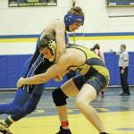 Homers Anthony Kalugin and Soldotna High Schools Liam Babitt grapple in a bout for the 189-pound weight class at the Best Western Bidarka Round Robin Rumble wrestling tournament Saturday, Oct. 19, 2019 in the Alice Witte Gymnasium in Homer, Alaska. (Photo by Megan Pacer/Homer News)