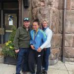 Lauren Kuhns, center, poses with her father, Lary Kuhns, left, and mother, Bridget Kuhns, right, after finishing the 2019 Boston Marathon, held April 15, 2019, in Boston. (Photo provided)