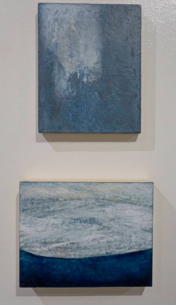 Kathy Smiths Glacier Color Study 1, top, and Glacier Color Study 2, bottom, two paintings in her exhibit, Rivers of Ice, showing at the Pratt Museum in Homer, Alaska. (Photo by Michael Armstrong/Homer News)