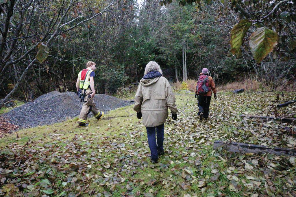 Homer Volunteer Fire Department Chief Mark Kirko, center, shows volunteers search areas at the fire hall as part of an effort on Sunday, Oct. 20, 2019, to find Anesha Duffy Murnane, reported missing on Oct. 17, 2019, in Homer, Alaska. About 50 people showed up that afternoon in an unsuccessful effort to find the missing woman. (Photo by Michael Armstrong/Homer News)