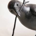 Photo by Jeffrey H. Dean                                 Jeffrey H. Deans bronze sculpture of a crow is featured at a First Friday show opening on Nov. 1 at his gallery in Homer.