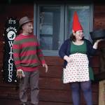 Sean Perry, left, and Eve Dickman,right, hand out candy at the home of Sean and Sandra Perry for Halloween on Oct. 31, 2019, in Homer, Alaska. (Photo by Michael Armstrong/Homer News)