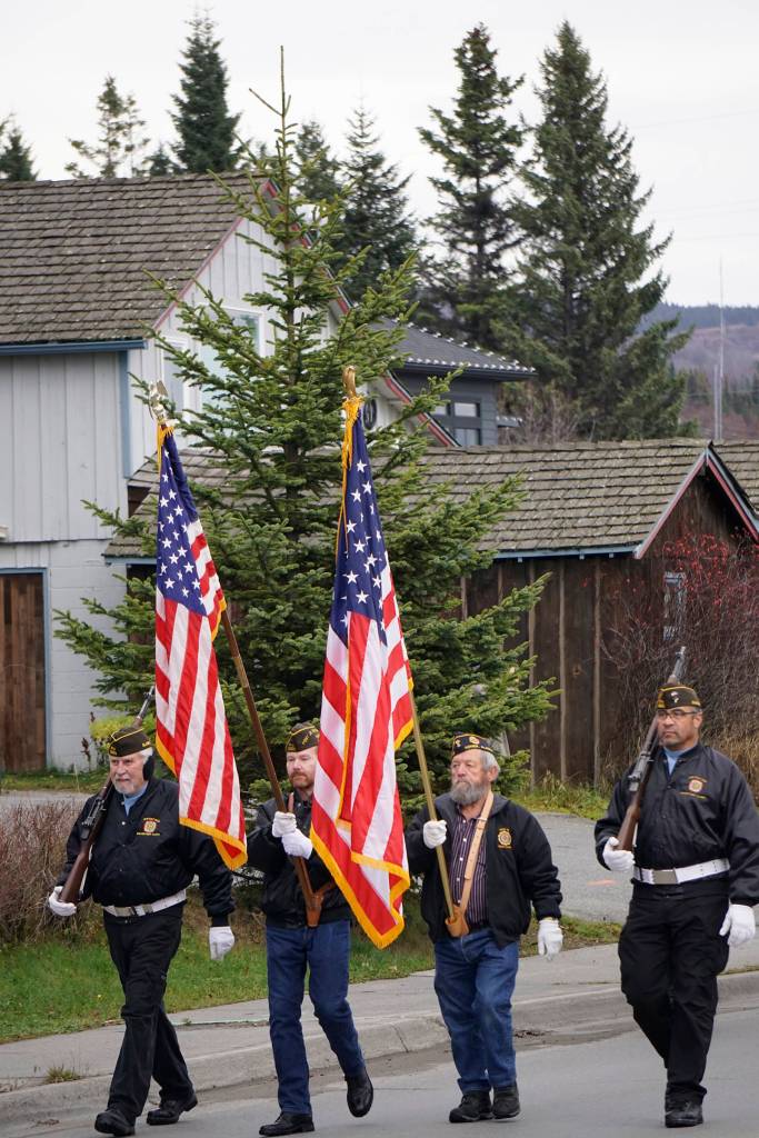 Members of the Veterans of Foreign Wars, Anchor Point Post, march on Pioneer Avenue in Veterans Day ceremonies on Nov. 11, 2019,in Homer, Alaska. (Photo by Michael Armstrong / Homer News)