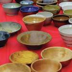 Bowls for sale are displayed at the annual Homer Community Food Pantrys Empty Bowls fundraiser on Friday, Nov. 8, 2019, at Homer United Methodist Church in Homer, Alaska. People could purchase just soup or, for $35, buy a handcrafted ceramic or wooden bowl with their soup. (Photo by Michael Armstrong/Homer News)