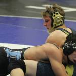 Homers Anthony Kalugin tries to get a reversal against Chugiaks Daniel Niebles during the Lancer Smith Memorial semifinals Friday, Nov. 15, 2019 in Wasilla, Alaska. (Photo by Jeremiah Bartz/Frontiersman)