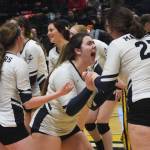 Homer teammate Katlyn Vogl (left) and Tonda Smude celebrate Saturday, Nov. 16, 2019, after winning the Class 3A state volleyball tournament at the Alaska Airlines Center in Anchorage, Alaska. (Photo by Joey Klecka/Peninsula Clarion)