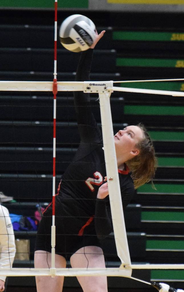 Kenais Bethany Morris puts up a shot Saturday, Nov. 16, 2019, against Homer at the Class 3A state volleyball tournament at the Alaska Airlines Center in Anchorage, Alaska. (Photo by Joey Klecka/Peninsula Clarion)
