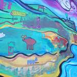 A mural of an Alaska habitat and animals painted by Fireweed Academy students is displayed on the outside of the school on East End Road on Friday, Nov. 22, 2019 in Homer, Alaska. Each quarter, students are creating a new mural to go along with a new education theme. (Photo by Megan Pacer/Homer News)