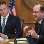 Michael Penn | Juneau Empire File                                Gov. Mike Dunleavy (left) listens to Attorney General Kevin Clarkson during a press conference at the Capitol on Jan. 30.