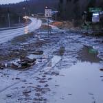 Michael Armstrong / Homer News                                Mud and debris is washed up at Bear Creek near East End Road on Monday afternoon in Homer. Bear Creek crosses East End Road near Bear Creek Drive and overflowed the creek banks.
