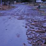 Michael Armstrong / Homer News                                Debris from a flood fills ditches along Meadow Drive near East End Road on Monday afternoon, in Homer. Bear Creek crosses East End Road near Bear Creek Drive and overflowed the creek banks.                                Debris from a flood fills ditches along Meadow Drive near East End Road on Monday afternoon, Dec. 9, 2019, in Homer, Alaska. Bear Creek crosses East End Road near Bear Creek Drive and overflowed the creek banks. (Photo by Michael Armstrong/Homer News)