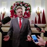 Gov. Mike Dunleavy, R-Alaska, speaks to members of the media before the Governors Open House on Tuesday, Dec. 10, 2019. (Michael Penn | Juneau Empire)