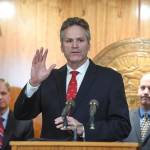 Gov. Mike Dunleavy announces his state budget during a press conference at the Capitol on Wednesday, Dec. 11, 2019. (Michael Penn | Juneau Empire)