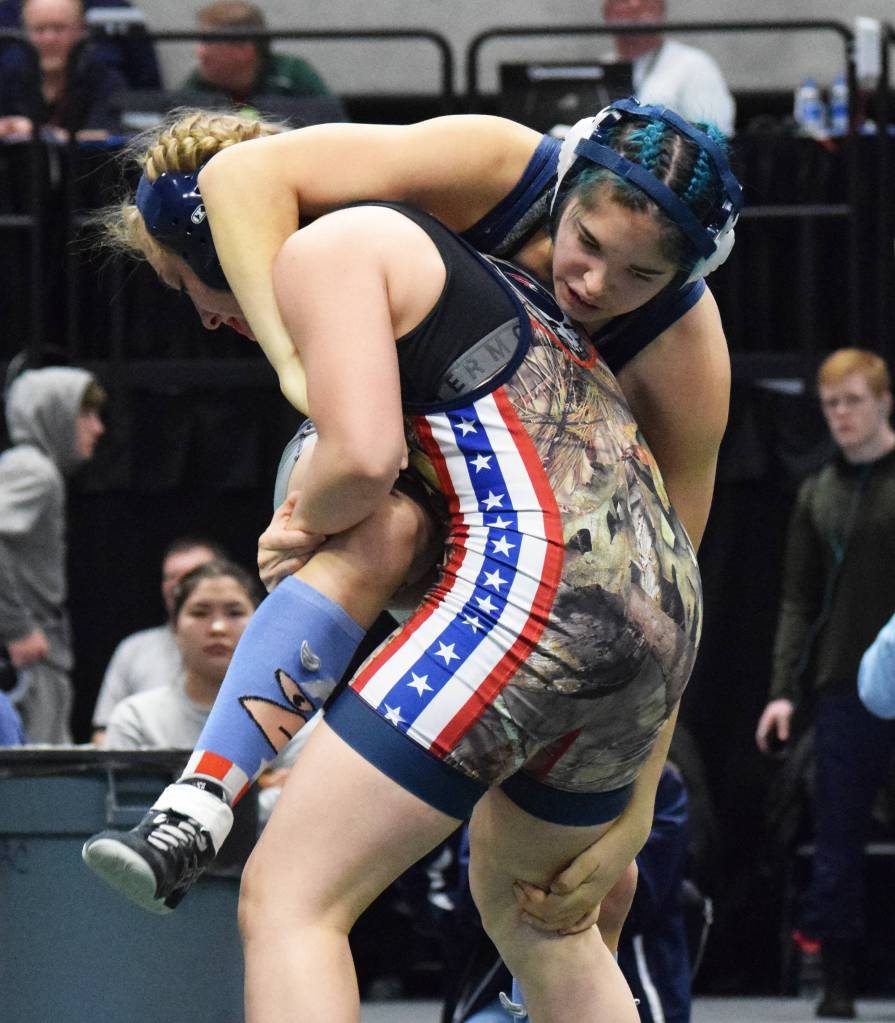 Soldotnas Trinity Donovan wrestles Emily Bellant of North Pole in the girls 145-pound final Saturday, Dec. 21, 2019, at the ASAA State Wrestling Championships at the Alaska Airlines Center in Anchorage, Alaska. (Photo by Joey Klecka/Peninsula Clarion)