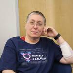 Tammie Willis is seen here at Kenai Peninsula College on Dec. 19, 2019. The bandage on her arm covers some of the cuts Willis received while being attacked at her home on Dec. 9. (Photo by Brian Mazurek/Peninsula Clarion)
