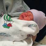 Ariyana Carlson rests in her mothers arms Friday, Jan. 3, 2020 in the birthing center at South Peninsula Hospital in Homer, Alaska. Carlson was the first baby born in Homer in the new year. (Photo by Megan Pacer/Homer News)