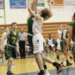 Homers Jonathan Raymond goes up for a shot during a Saturday, Jan. 11, 2020 basketball game against Seward High School in the Alice Witte Gymnasium in Homer, Alaska. (Photo by Megan Pacer/Homer News)