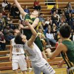 Sewards Trey Ingalls takes a shot on the Homer basket during a Saturday, Jan. 11, 2020 basketball game between the two teams in the Alice Witte Gymnasium in Homer, Alaska. (Photo by Megan Pacer/Homer News)