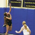 Sewards Sequoia Sieverts jumps to make a shot during a Saturday, Jan. 11, 2020 basketball game against Homer High School in the Alice Witte Gymnasium in Homer, Alaska. (Photo by Megan Pacer/Homer News)