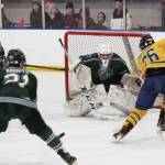 Photo by Megan Pacer/Homer News                                 Homers Ethan Pitzman prepares to take a shot at Colonys goalkeeper, Bryant Marks, during a Friday, Jan. 10, 2020 hockey game between the two schools at Kevin Bell Arena in Homer, Alaska.